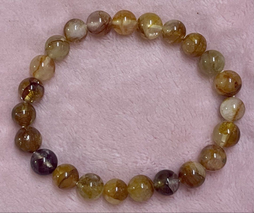 Golden Healer Bracelet 8mm (Category: Bracelets) located in Manila. Submitted by Crystal_Oracle (Listing ID 1468742339, Image 2). Description: Golden Healer Quartz is a variety of clear quartz with iron oxide inclusions that give it a yellow, amber, or golden hue. In crystal healing and alternative wellness traditions, it is considered a master healer. Metaphysical and Energetic Benefits: • Chakra Alignment: Balances and activates all chakras, wi