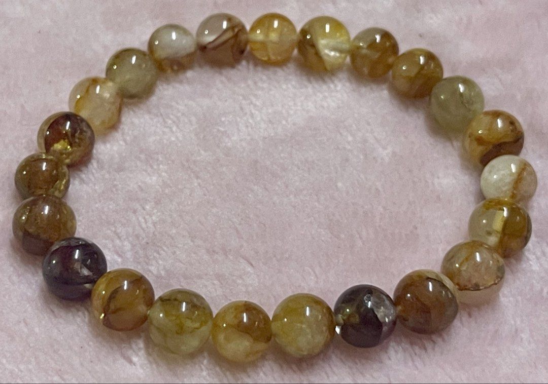 Golden Healer Bracelet 8mm (Category: Bracelets) located in Manila. Submitted by Crystal_Oracle (Listing ID 1468742339, Image 1). Description: Golden Healer Quartz is a variety of clear quartz with iron oxide inclusions that give it a yellow, amber, or golden hue. In crystal healing and alternative wellness traditions, it is considered a master healer. Metaphysical and Energetic Benefits: • Chakra Alignment: Balances and activates all chakras, wi