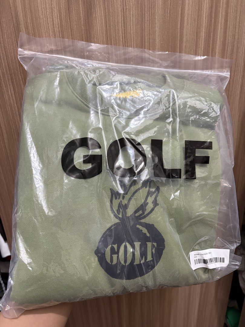 GOLF Wang Bomb Crewneck Green (Category: Coats, Jackets and Outerwear) located in Quezon City. Submitted by LouizCastro (Listing ID 1468885148, Image 2). Description: - Brand: GOLF Wang - Item: Bomb Crewneck Sweater - Color: Green - Size: Medium - Condition: Brand new in original plastic bag with barcode tag (unopened/unworn) - Details: Graphic print with GOLF lettering on the chest -MOP: Gcash/Gotyme -Shipping: Buyer shoulders shipping and choos