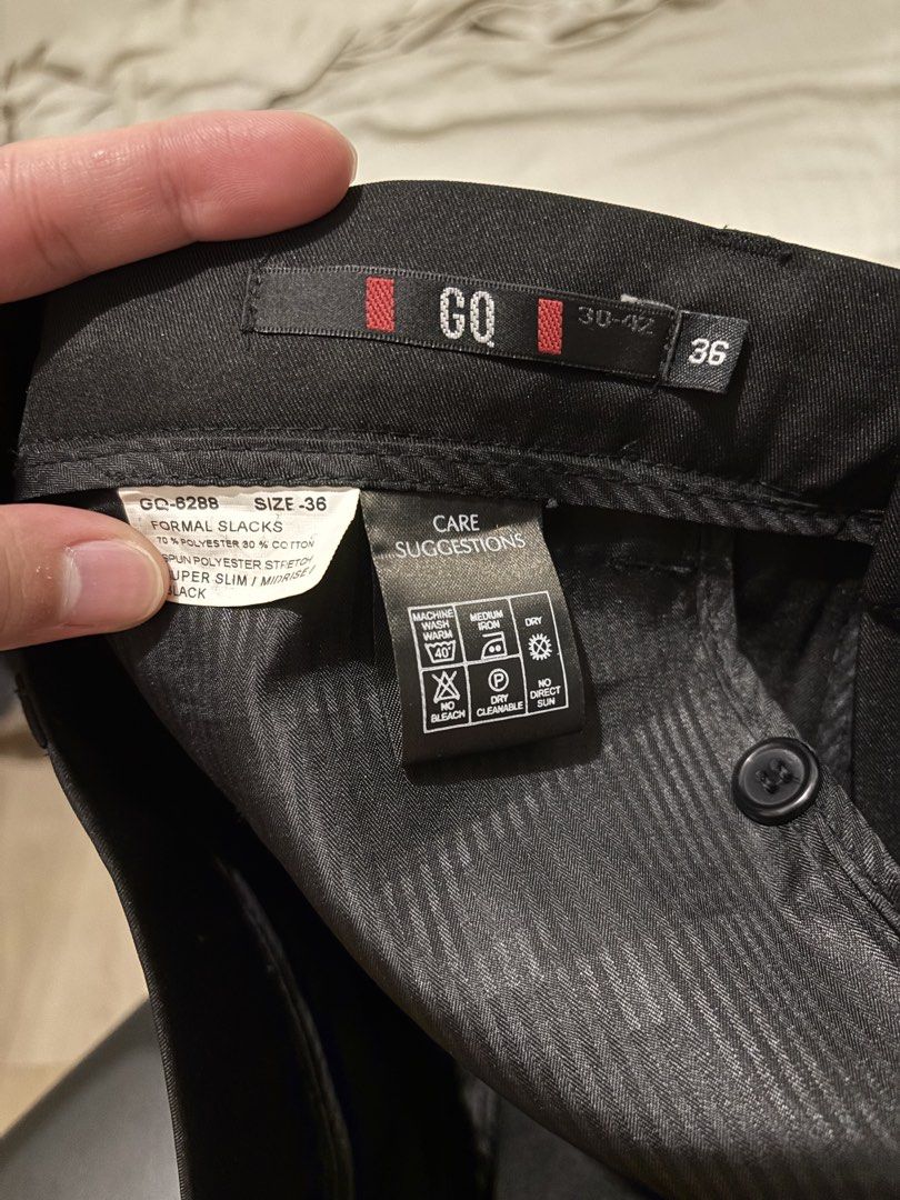 GQ Tailored Fit Formal Slacks Size 36 Black (Category: Trousers) located in Mandaluyong City. Submitted by jacobsss23 (Listing ID 1468860622, Image 1). Description: - Brand: GQ - Color: Black - Size: 36 (Super Slim, Midrise, Tailored fit) - Material: 70% Polyester, 30% Cotton Spun Polyester Stretch - Condition: Brand new with tags (BNWT), never worn - Source: Purchased from SM Store - Original Price: ₱1,699 - Selling Price: ₱1,200.
