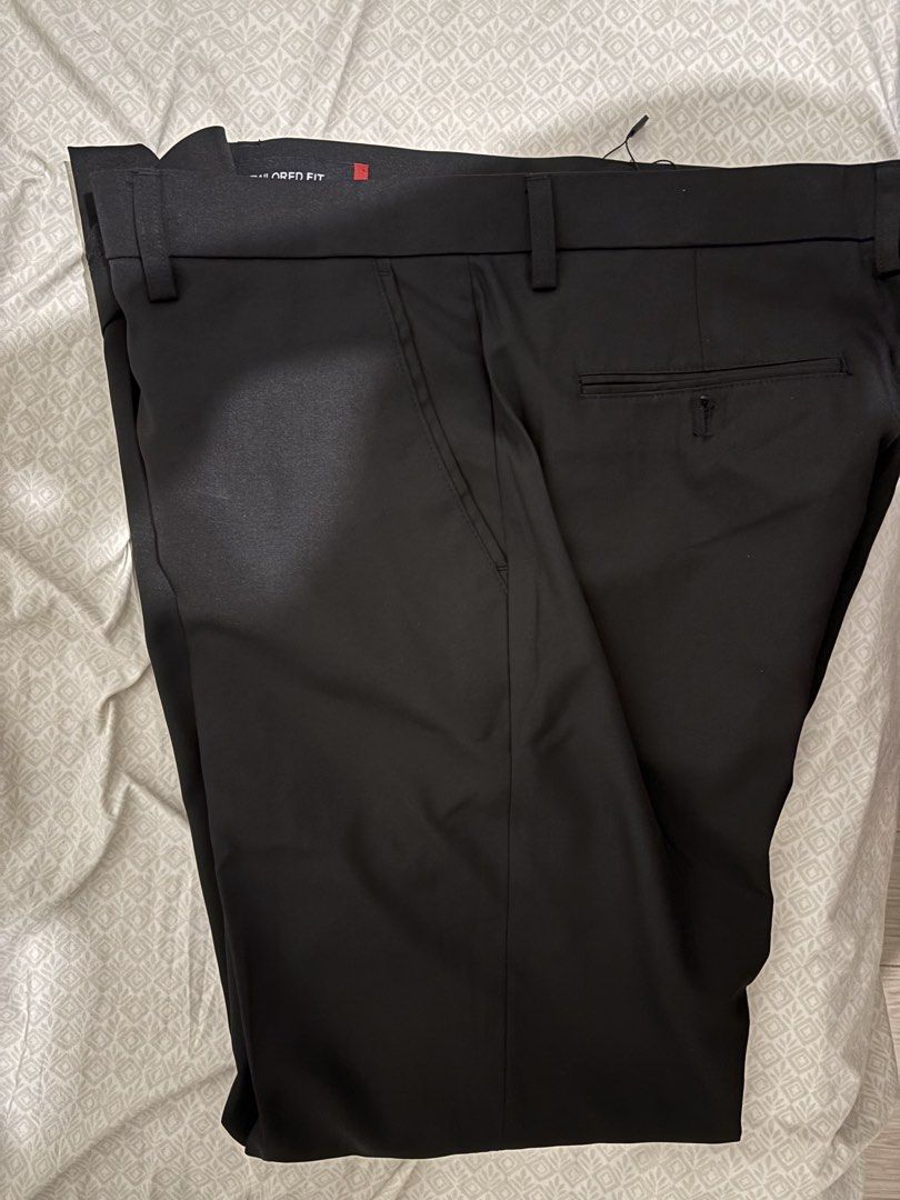 GQ Tailored Fit Formal Slacks Size 36 Black (Category: Trousers) located in Mandaluyong City. Submitted by jacobsss23 (Listing ID 1468860622, Image 3). Description: - Brand: GQ - Color: Black - Size: 36 (Super Slim, Midrise, Tailored fit) - Material: 70% Polyester, 30% Cotton Spun Polyester Stretch - Condition: Brand new with tags (BNWT), never worn - Source: Purchased from SM Store - Original Price: ₱1,699 - Selling Price: ₱1,200.