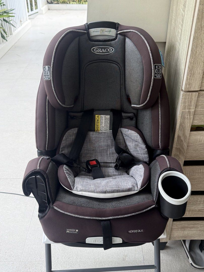Graco 4Ever DLX Car Seat (Category: Car Seats) located in Cavite. Submitted by heyitsmeberna (Listing ID 1468755668, Image 1). Description: - Authentic Graco 4Ever DLX convertible car seat adjustable headrest for growing kids - Convenient integrated side cup holder - RapidRemove cover for quick and hassle-free washing - Secure harness system with solid build for maximum safety Note: Missing 1 cup na missplace. The item is as is where is😉.