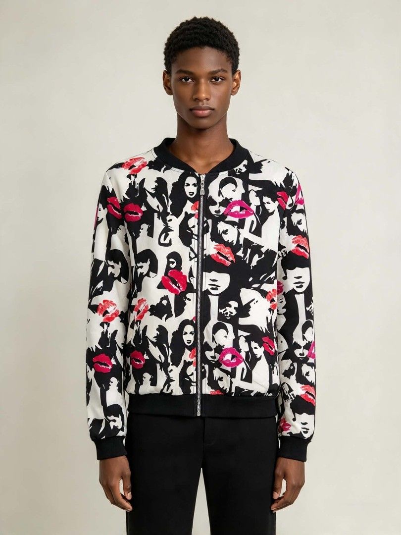 Graphic Print Zip-Up Bomber Jacket Women's Medium (Category: Coats, Jackets and Outerwear) located in Caloocan City. Submitted by mylove326 (Listing ID 1468803868, Image 1). Description: - Eye-catching black and white jacket with bold red lip and woman face graphics - Zip-up front closure for easy wear - Comfortable ribbed collar, cuffs, and hem - Lightweight material, perfect as an outer layer for everyday outfits - Refer to pictures for detaile