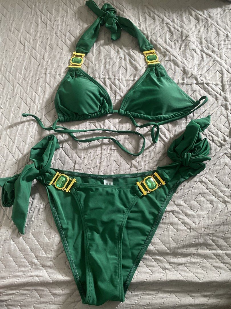 Green bikini set with rhinestone hardware size S (Category: Bikinis & Swimsuits) located in Manila. Submitted by newkkmora98454 (Listing ID 1468750696, Image 1). Description: - Condition: Brand new, unworn. Bought it for swimming pero di natuloy - Size: Small - Color: Emerald green - Style: Triangle halter top with matching side-tie bottoms - Details: Gold-tone hardware with large green crystal accent stones - Material: 80% polyamide, 20% elastan