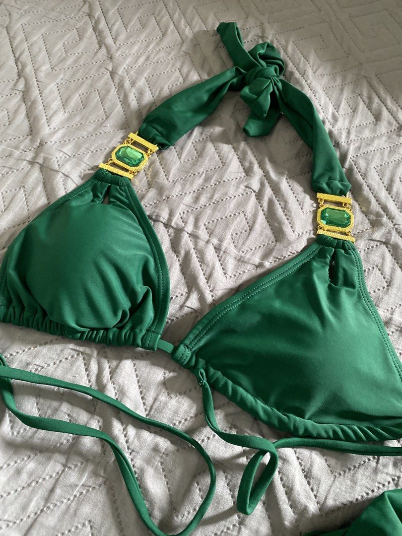 Green bikini set with rhinestone hardware size S (Category: Bikinis & Swimsuits) located in Manila. Submitted by newkkmora98454 (Listing ID 1468750696, Image 3). Description: - Condition: Brand new, unworn. Bought it for swimming pero di natuloy - Size: Small - Color: Emerald green - Style: Triangle halter top with matching side-tie bottoms - Details: Gold-tone hardware with large green crystal accent stones - Material: 80% polyamide, 20% elastan