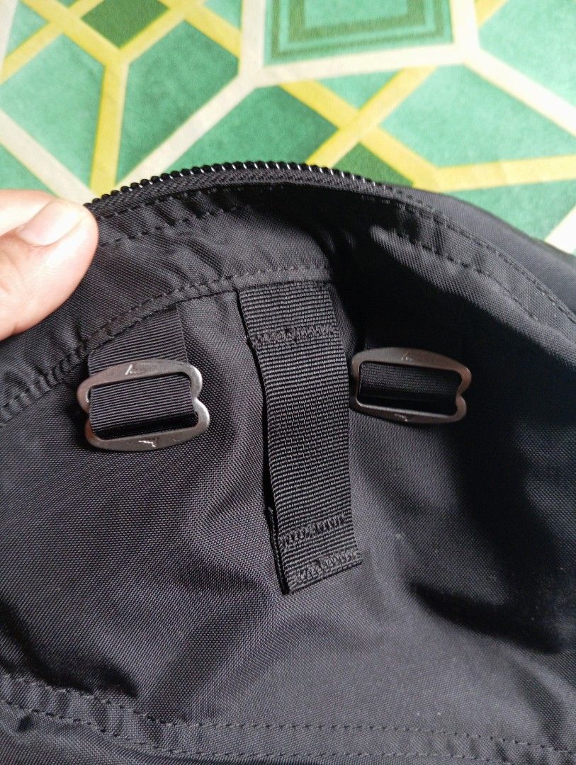Gregory Black Nylon Backpack with Leather Zipper Pulls (Category: Backpacks) located in Manila. Submitted by jzk25 (Listing ID 1468729808, Image 2). Description: - Brand: Gregory - Color: Classic Black - Material: 100% Nylon (Exterior and Lining) - Origin: Made in Philippines - Hardware: Smooth YKK zippers with stylish brown leather pull tabs - Features: Front zippered pocket, adjustable strap loops on front panel, and clean interior with care ta