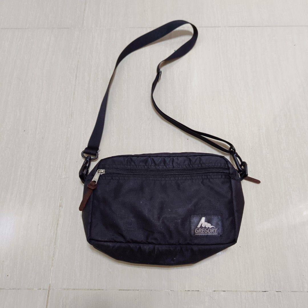 Gregory Nylon Crossbody Sling Bag Black (Category: Sling Bags) located in Nasugbu. Submitted by staffpicks1515 (Listing ID 1468786071, Image 2). Description: - Brand: Gregory - Color: Classic Black - Material: Durable high-quality nylon - Strap: Adjustable crossbody strap for custom fit - Pockets: Main zip compartment, front zip pocket with leather pull tabs, and interior slip pockets - Hardware: Smooth and reliable YKK zippers throughout - Condi