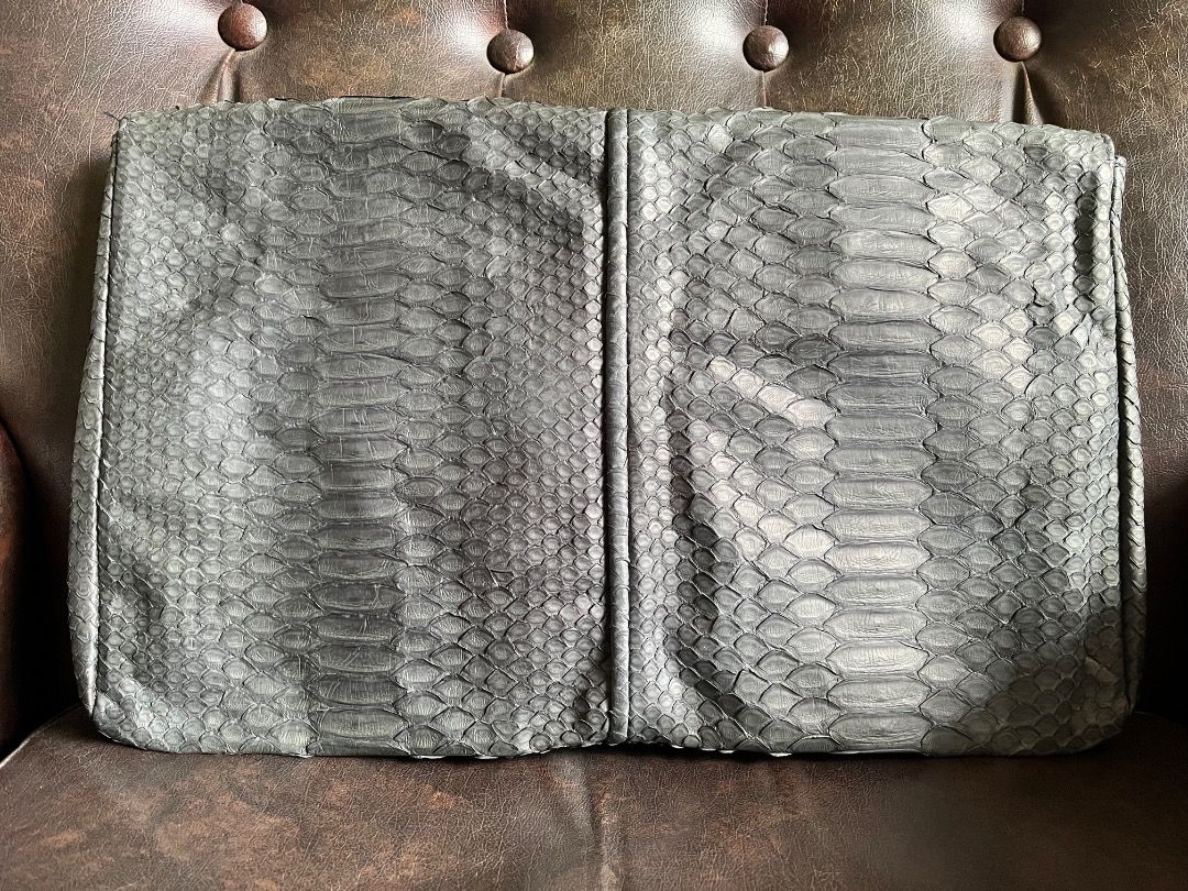 Grey Python Snakeskin Leather Large Envelope Clutch Bag (Category: Clutches) located in Makati City. Submitted by Ina_Ndang (Listing ID 1468713731, Image 2). Description: Grey python skin leather clutch/ envelope bag Can be used as laptop bag No flaws to declare Approx. dimension: 14.5" (W), 9.5" (H), 2" (D) Payment thru Gcash Shipping thru J&T or depending on available courier NO RUSH shipping NO RETURN.