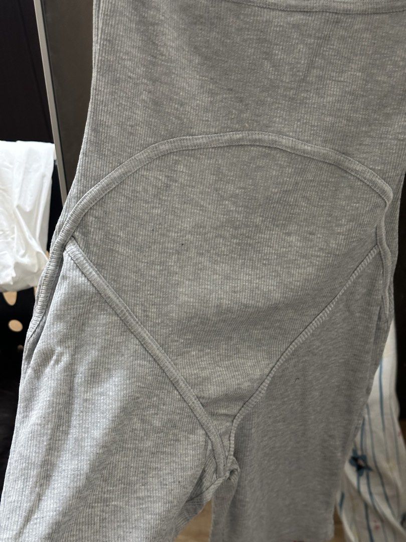Grey Ribbed Bodysuit Romper Biker Shorts (Category: Rompers) located in Villasis. Submitted by juliaxgamboa (Listing ID 1468808931, Image 3). Description: - Style: Grey ribbed romper with biker shorts - Neckline & Straps: Scoop neck with thick straps - Design: Paneled stitching around chest and lower stomach for a flattering shape - Material: Stretchy cotton knit - Condition: Clean, no stains or holes - Versatility: Perfect for casual days out or