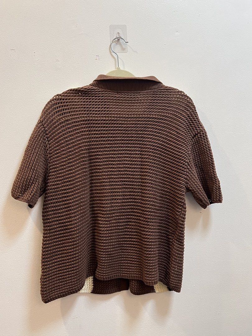 Gryle Brown Open Knit Polo Shirt Medium (Category: Tshirts & Polo Shirts ) located in Makati City. Submitted by skustaflea (Listing ID 1468890280, Image 3). Description: Knit Brown short sleeve polo with cream vertical stripes on the front from Gryle Size: Medium, 62.5cm length 49cm width Clean and simple fit for casual events and maybe christmas party or office ganaps. Rfs: not my style anynore Buyer handles pick up or shipping form Makati.