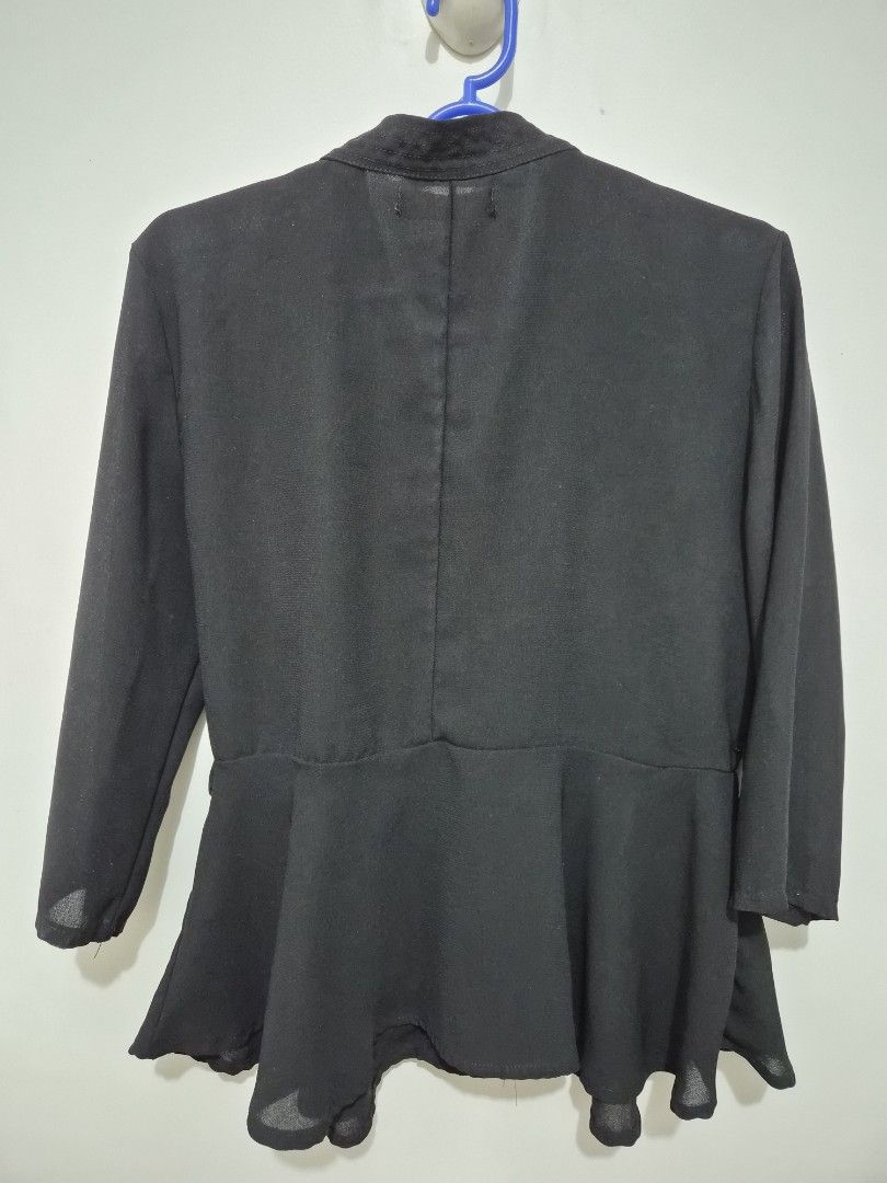 GTW FAB Black Long Sleeve Peplum Blazer Jacket (Category: Coats, Jackets and Outerwear) located in Mandaluyong City. Submitted by joyce1593 (Listing ID 1468819123, Image 2). Description: - Brand: GTW FAB - Color: Black - Style: V-neck wrap front peplum blazer with long sleeves and flared ruffle hem - Fit: Structured shoulders and fitted waist silhouette - Details: Clean back with vertical seam detail - Fabric: Lightweight and easy to style for wo