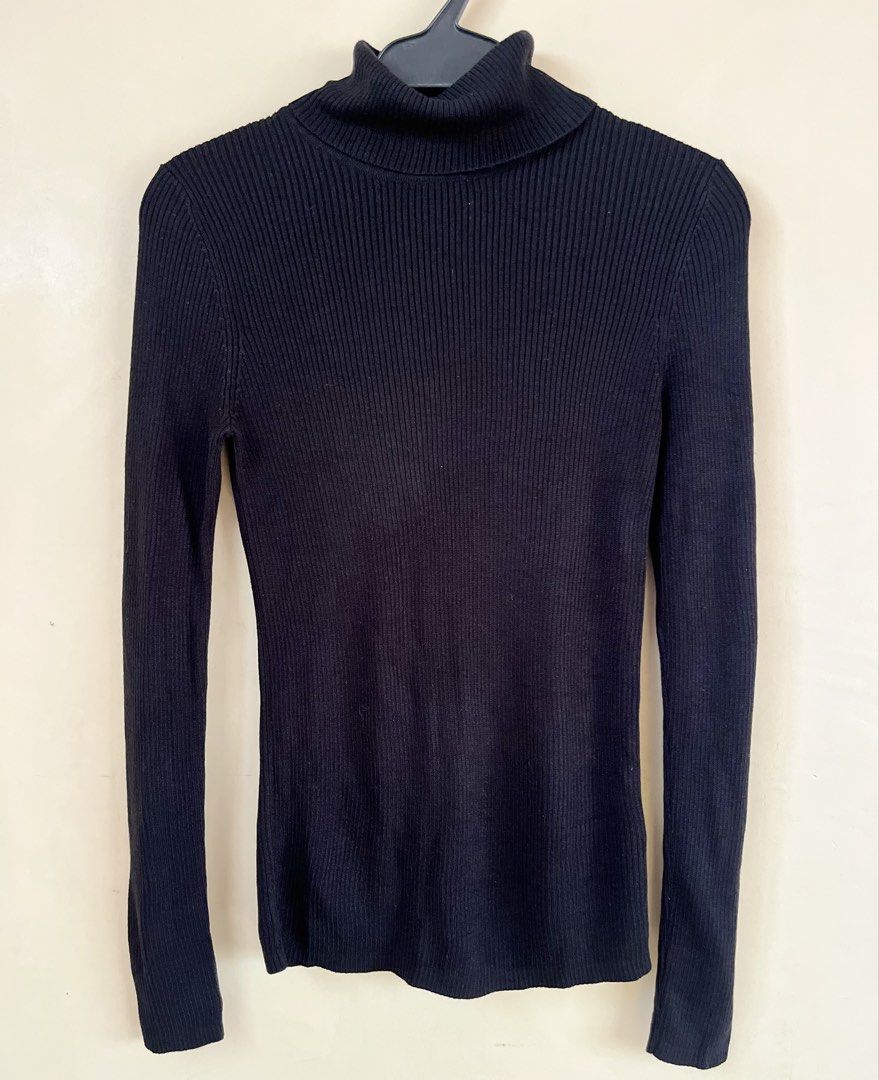 GU Black Ribbed Turtleneck Long Sleeve Sweater (Category: Longsleeves) located in Binan City. Submitted by hannahbanana928 (Listing ID 1468714976, Image 2). Description: - Color: Classic black - Style: Long sleeves, fitted silhouette, ribbed turtleneck - Fabric: Soft, stretchy knit - Best for: Great layering piece for cold weather Flaw: Has a small hole around the neckline due to washing, but it’s barely noticeable and easily hidden when worn..