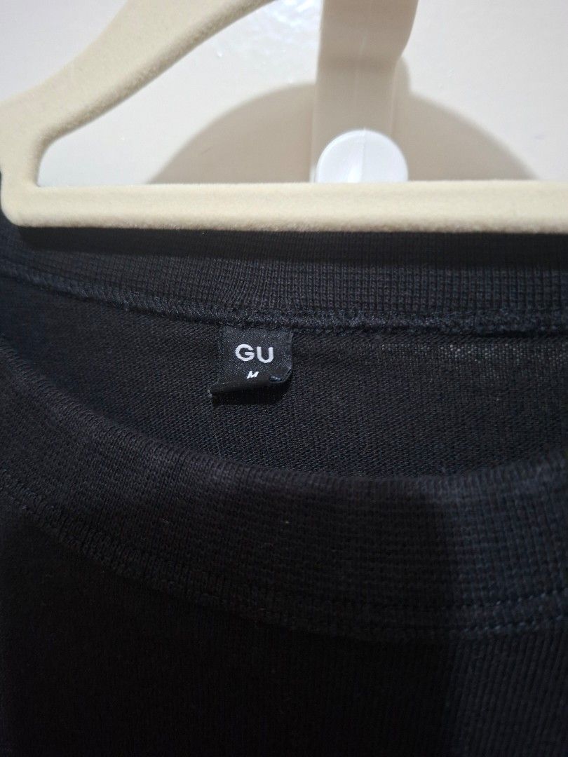 GU Black T-shirt Size M crew neck (Category: Shirts) located in Paranaque City. Submitted by potatoiceblended (Listing ID 1468790548, Image 2). Description: - Brand: GU - Color: Black - Size: Medium - Material: 100% Cotton - Design: Simple crew neck, short sleeves - Style: Versatile basic, easy to match with any casual outfit - Condition: Great for everyday wear.