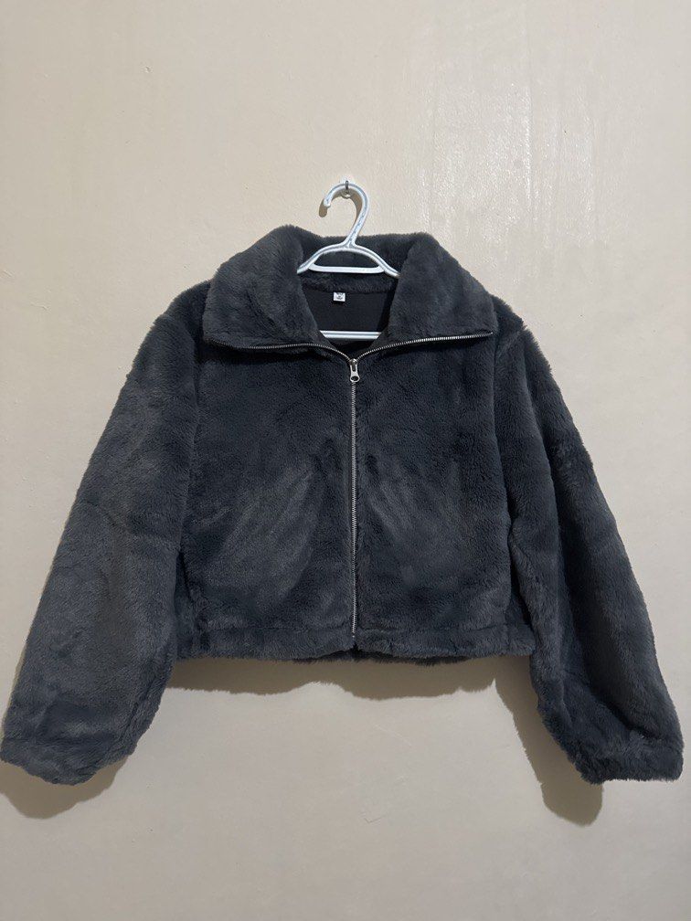 GU Faux fur jacket (Category: Coats, Jackets and Outerwear) located in Quezon City. Submitted by brandsetcph (Listing ID 1468790711, Image 1). Description: Gu Faux Fur Crop Jacket Used once in Japan Size: medium on tag (18x20in) Color: dark gray.
