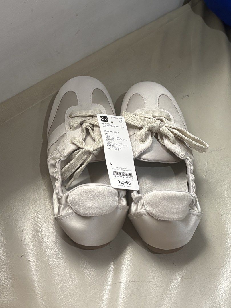 GU Gathered Ballet Sneakers (Category: Sneakers) located in Pasig City. Submitted by kunig (Listing ID 1468791395, Image 1). Description: Brand: GU (Gather Ballet Sneaker) - Color: Light gray satin with white laces and gum soles - Size: S (fits 22.5 cm) - Condition: Brand new with tags (BNWT), never worn - Original Price: 2,990 yen -RFS: need to size high up.