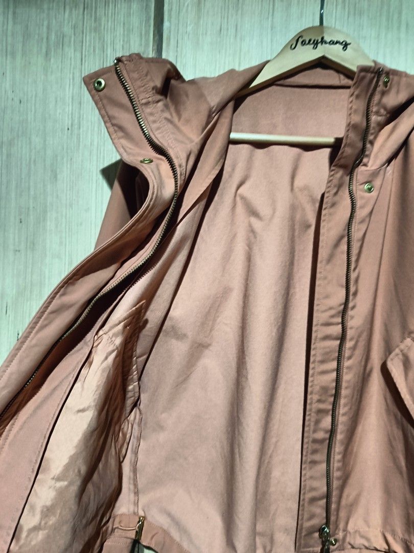 GU MOUNTAIN PARKA (Category: Coats, Jackets and Outerwear) located in Angeles City. Submitted by faeyhang0223 (Listing ID 1468718809, Image 2). Description: - Brand: GU - Color: Dusty Pink - Size: XS (Tag attached) - Material: 100% Polyester - Closure: Full zip with snap button flap - Pockets: Two front flap pockets with buttons - Features: Drawstring hem and fully lined interior - Condition: Clean inside and out, brand new with tag.