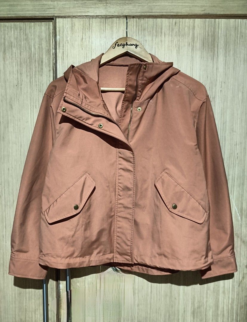 GU MOUNTAIN PARKA (Category: Coats, Jackets and Outerwear) located in Angeles City. Submitted by faeyhang0223 (Listing ID 1468718809, Image 1). Description: - Brand: GU - Color: Dusty Pink - Size: XS (Tag attached) - Material: 100% Polyester - Closure: Full zip with snap button flap - Pockets: Two front flap pockets with buttons - Features: Drawstring hem and fully lined interior - Condition: Clean inside and out, brand new with tag.