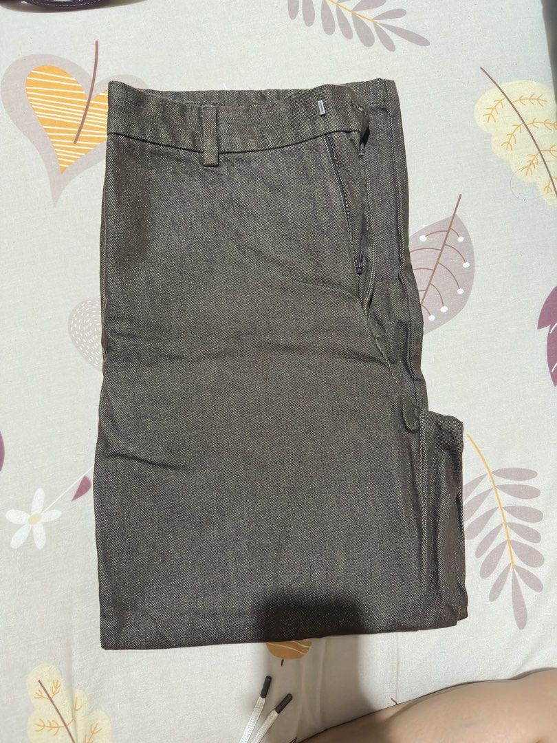 GU Twill Wide Straight Pants (Category: Jeans) located in Quezon City. Submitted by dragonlily_07251820 (Listing ID 1468810022, Image 2). Description: - Brand/Model: GU - Color: Brown - Size: XL (Waist: 87cm) - Material: 100% structured cotton - Details: Pleated front creases, zip fly with button closure, belt loops - Fit: Comfortable loose fit through the legs - Condition: Excellent, never worn/used.