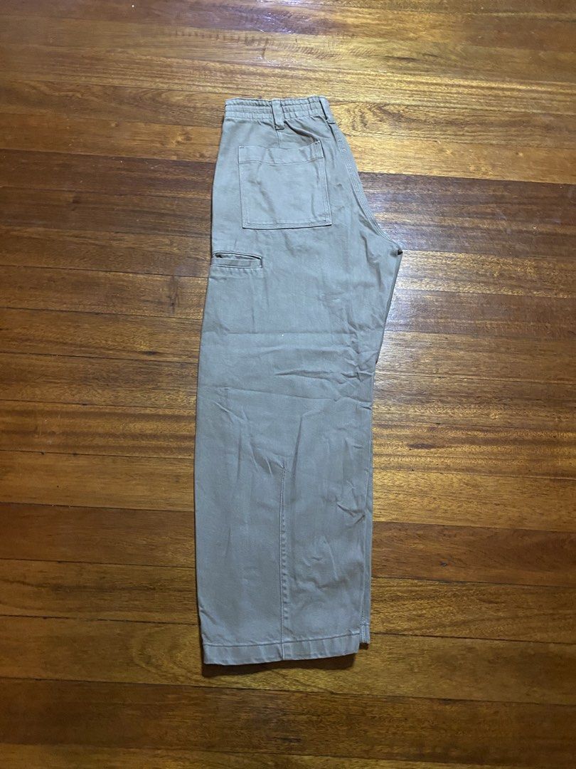 GU Wide Fit Work Pants Size M (Category: Trousers) located in Baguio. Submitted by cs_studio248 (Listing ID 1468839632, Image 2). Description: - Brand: GU - Style: Wide fit work pants with a relaxed straight leg cut - Color: Versatile beige - Size: M (77cm waist) - Material: 100% cotton - Features: Internal drawstring waistband, practical side and back utility pockets - Perfect for effortless, everyday casual styling.