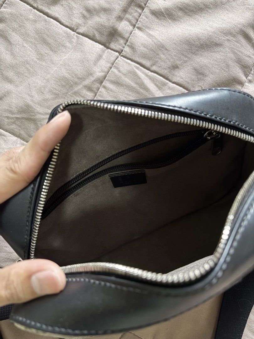 Gucci GG Supreme Canvas Messenger Bag (Category: Luxury Bags & Wallets) located in Manila. Submitted by rich028 (Listing ID 1468731925, Image 2). Description: - Brand: Gucci - Material: GG Supreme canvas with black leather trim - Hardware: Silver-toned - Closure: Secure zip top - Strap: Adjustable web strap with charming mini key detail - Interior: Soft fabric lining with zip pocket and official leather brand tag - Condition: Clean stitching, str