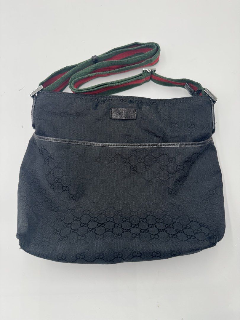 GUCCI project crossbody (Category: Luxury Bags & Wallets) located in Cagayan de Oro. Submitted by KoaApparelAtbp. (Listing ID 1468905200, Image 1). Description: Has many runs but not ripped. Can fit 14" laptop crossbody bag. Black color not faded.