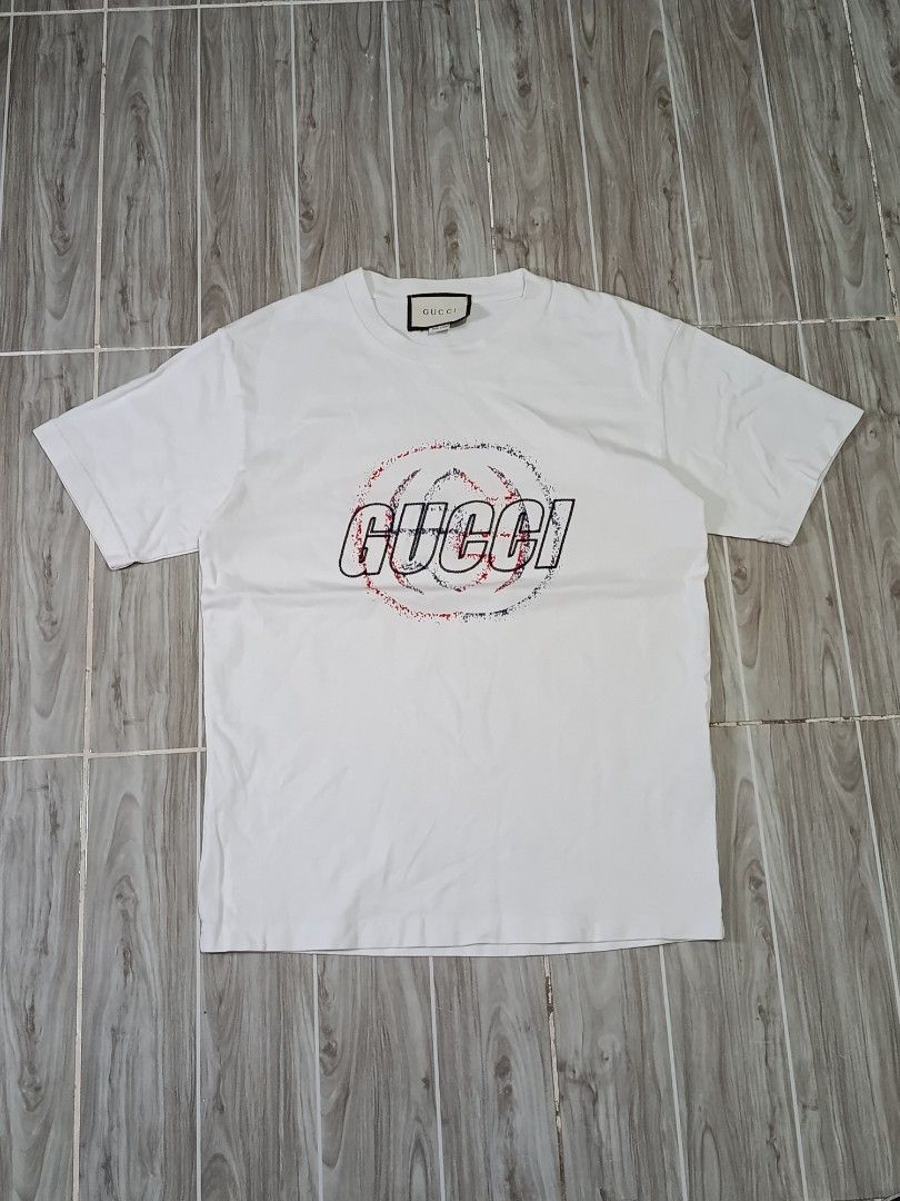 GUCCI TSHIRT (freeshipping) (Category: Tshirts & Polo Shirts ) located in Quezon City. Submitted by gyl-stop (Listing ID 1468850113, Image 1). Description: free shipping 19 x 26 excellent condi cr: 9.8/10 issue: none.
