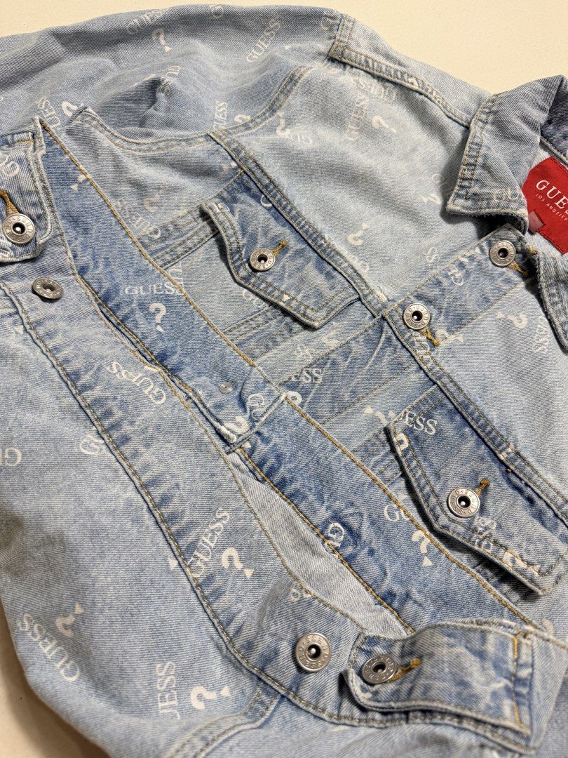 Guess Monogram Denim Jacket (Category: Coats, Jackets and Outerwear) located in Baguio. Submitted by Vintogi.finds (Listing ID 1468792617, Image 3). Description: Width: 21 Length: 25 BOXY Medium on tag Fits Medium to Large Color rate: 9.8/10 Pristine Condition ✨.