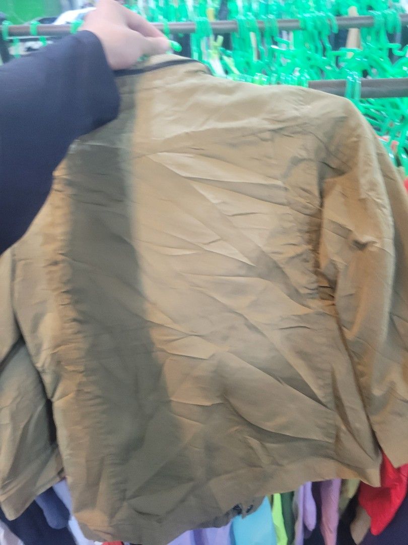 Guess Olive Green Cargo Jacket with Patch (Category: Coats, Jackets and Outerwear) located in Manila. Submitted by surpppp (Listing ID 1468814015, Image 2). Description: - Brand: Guess - Color: Olive green - Design: Multiple front pockets with button flaps, shoulder patch detail, and striped inner collar lining - Closure: Secure zip and button front closure - Fit: Standard fit with solid, durable construction - Perfect for: Great layering piece f