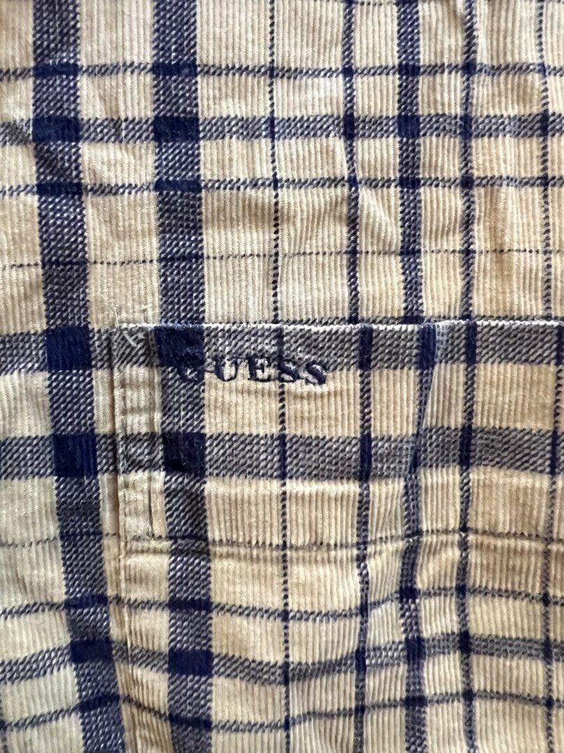 Guess Plaid Corduroy Button-down 100% Cotton (Category: Tshirts & Polo Shirts ) located in Makati City. Submitted by skustaflea (Listing ID 1468892286, Image 3). Description: - Brand: Guess Classic Sportswear - Size: Small fits like a large to medium. 69cm length (front) 77cm length (back) and around 50cm for the width - 100% Cotton - Beige and navy plaid pattern on long sleeve corduroy, has embroidered Guess logo and curved hemline as well Cute 