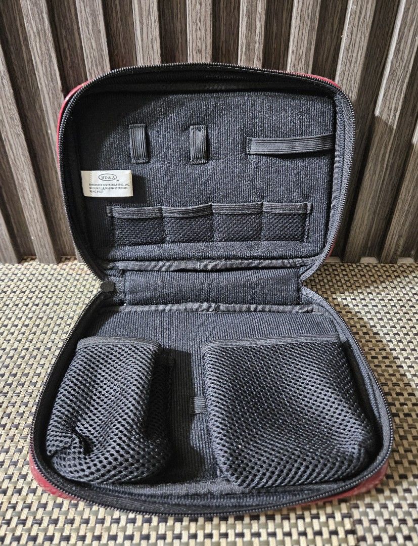 Guitar Hero On Tour Red Glitter Storage Case BD&A (Category: Music Accessories) located in Rizal. Submitted by cherry_garcia (Listing ID 1468791993, Image 3). Description: - Brand: BD&A (Guitar Hero On Tour case) - Color/Finish: Eye-catching red glitter with a shiny finish and front logo - Closure: Secure zip-around design - Interior Organization: Black mesh pockets, elastic loops, and card slots - Condition: Clean inside and out, great accessory