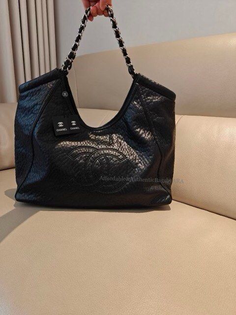 GWP CHANEL BLACK CHAINED TOTE BAG (Category: Tote Bags) located in Daet. Submitted by ecassenluxuries (Listing ID 1468738403, Image 1). Description: 📌 FIXED PRICE ALREADY ▫️Brand: Chanel ▫️Material: Premium black grained soft leather with silver-tone hardware ▫️Design: Classic hobo style featuring a large stitched interlocking CC logo on the front ▫️Strap: Silver-tone chain interwoven with black leather for comfortable shoulder wear ▫️Closure: S