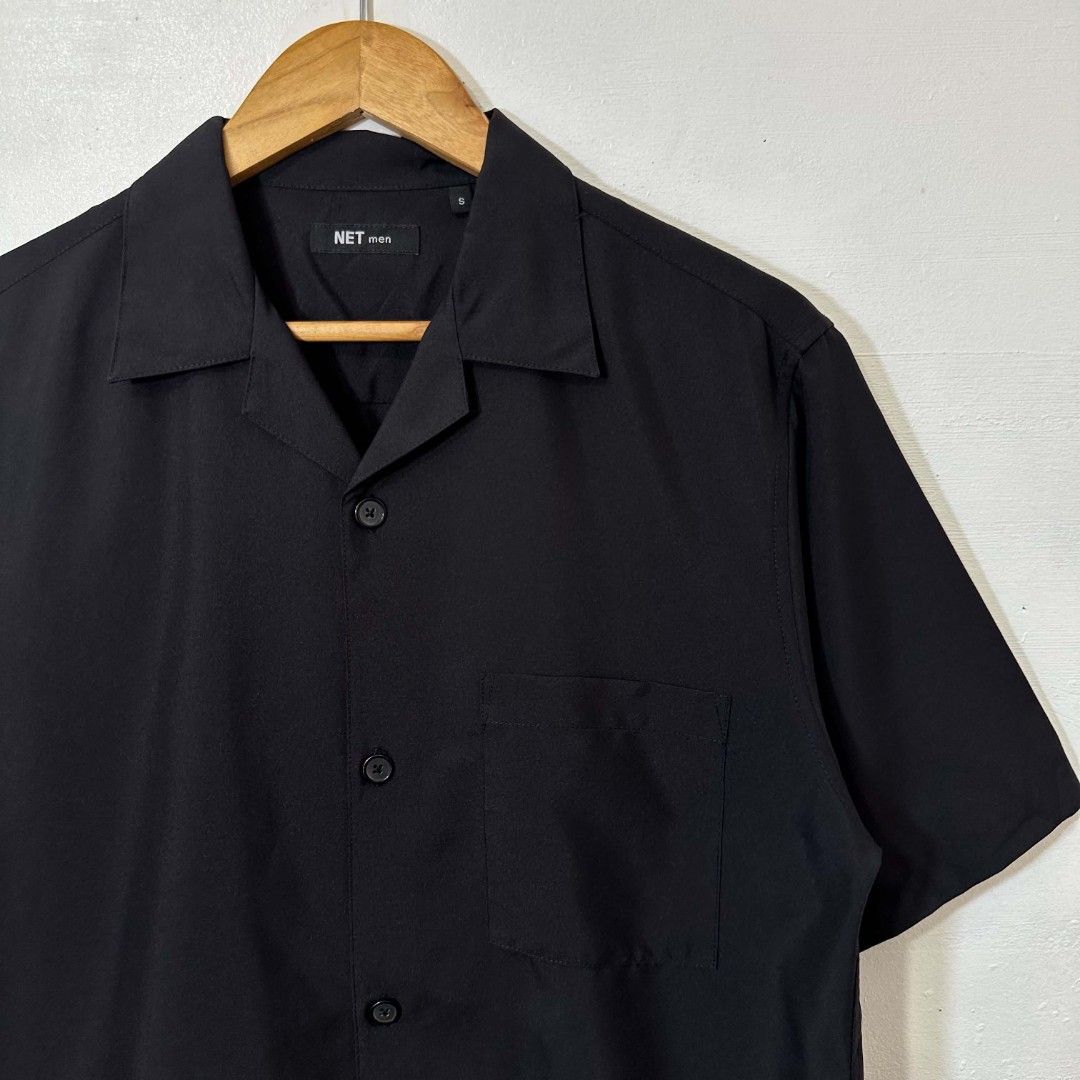 #H973 Net Men Classic Open Collar Polyester Button Polo (Black) (Category: Activewear) located in Tagum. Submitted by eightrags (Listing ID 1468780701, Image 2). Description: #H973 Net Men Classic Open Collar Polyester Button Polo (Black) Small best fit Medium 21 W 27 L Good as new condition 400.