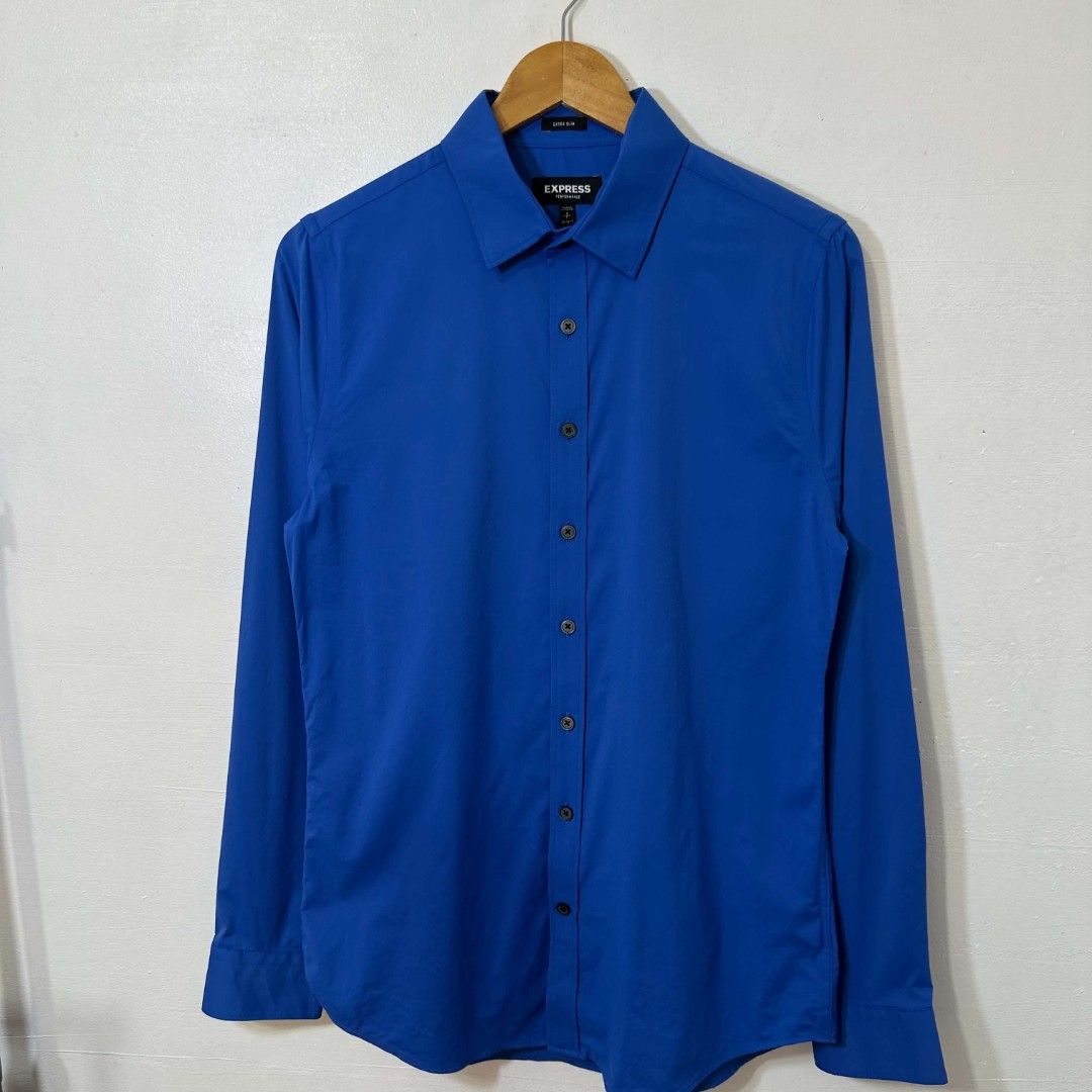 #H976 Express Performance Extra Slim Button Long-Sleeve (Royal Blue) (Category: Activewear) located in Tagum. Submitted by eightrags (Listing ID 1468781228, Image 1). Description: #H976 Express Performance Extra Slim Button Long-Sleeve (Royal Blue) Small 18 W 27 L Good as new condition 300.