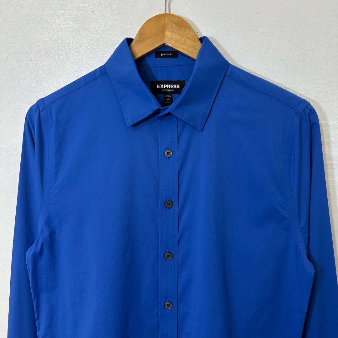 #H976 Express Performance Extra Slim Button Long-Sleeve (Royal Blue) (Category: Activewear) located in Tagum. Submitted by eightrags (Listing ID 1468781228, Image 2). Description: #H976 Express Performance Extra Slim Button Long-Sleeve (Royal Blue) Small 18 W 27 L Good as new condition 300.