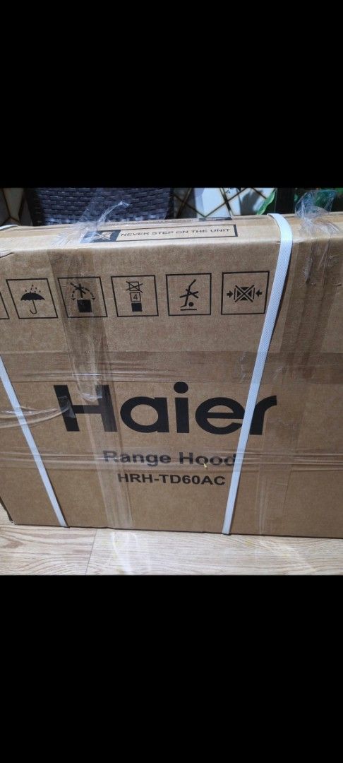 Haier HRH-TD60AC Range Hood (Category: Hobs & Hoods) located in Pasig City. Submitted by nancyshoppe_5811 (Listing ID 1468802958, Image 3). Description: - Brand: Haier Model: HRH-TD60AC - Design: Slim black finish, perfect for under-cabinet installation - Controls: Convenient front panel push buttons - Performance: Effectively keeps kitchen air fresh and smoke-free - Condition: Brand new, comes in original box.