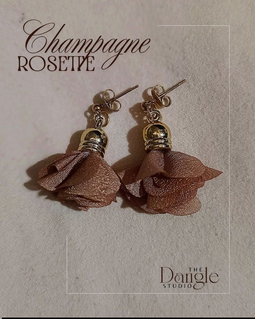 Handmade Tassel Earrings (Category: Earrings) located in Manila. Submitted by the_dangle_studio (Listing ID 1468798010, Image 1). Description: Handmade Floral Tassel Earrings Add a touch of elegance to your everyday look with these beautiful handmade tassel earrings, featuring delicate, flower-inspired fabric tassels and elegant gold-tone accents! Available Designs: Sahara Bloom – Rich chocolate brown for a warm, earthy, and elegant look. Champag