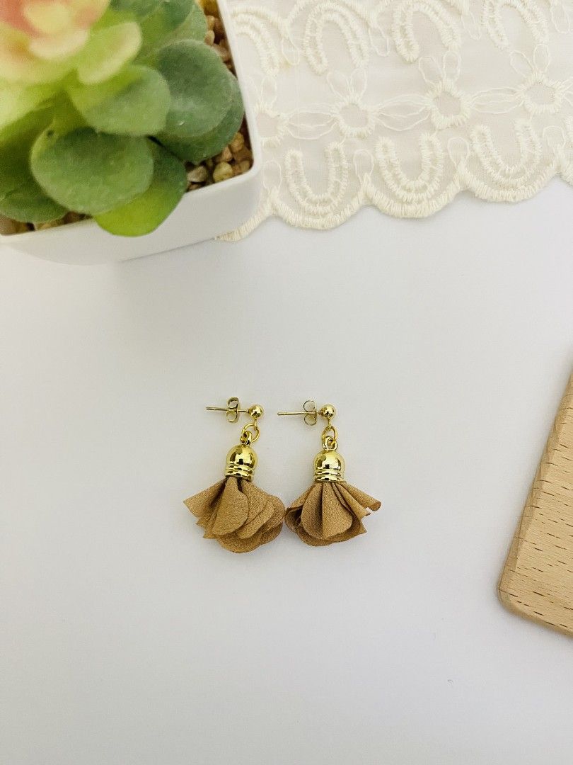 Handmade Tassel Earrings (Category: Earrings) located in Manila. Submitted by the_dangle_studio (Listing ID 1468798010, Image 2). Description: Handmade Floral Tassel Earrings Add a touch of elegance to your everyday look with these beautiful handmade tassel earrings, featuring delicate, flower-inspired fabric tassels and elegant gold-tone accents! Available Designs: Sahara Bloom – Rich chocolate brown for a warm, earthy, and elegant look. Champag