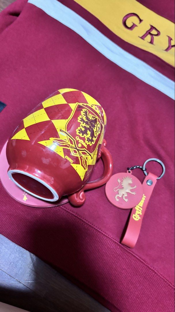 Harry Potter (Gryffindor) (Category: Other Stationery & Craft) located in Paranaque City. Submitted by harugaxx (Listing ID 1468929983, Image 3). Description: * Gryffindor Sweatshirt (HP x Spao Korea Collaboration) Size Tag: Large, can actually fit for 2xl-3Xl * Gryffindor Totebag (Fullybooked) * Gryffindor Mug (Miniso) * Time Turner Keychain (Universal Studios) Sold as a whole set. Free shipping within Metro Manila..