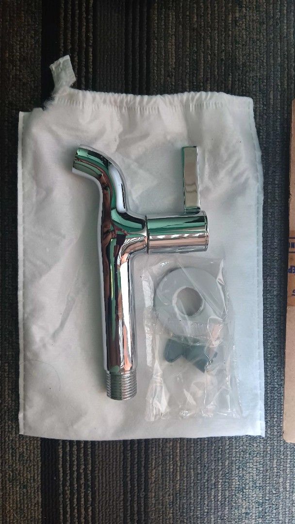 HCG chrome wall faucet with lever handle (Category: Bathroom & Kitchen Fixtures) located in Manila. Submitted by nicko1107 (Listing ID 1468778875, Image 2). Description: - Brand: HCG - Type: Chrome wall-mounted faucet with long spout and modern lever handle - Condition: Brand new, never installed (renovation leftover) - Inclusions: Original box, mounting ring, and hardware accessories in sealed plastic packaging - Finish: Shiny metallic chrome.
