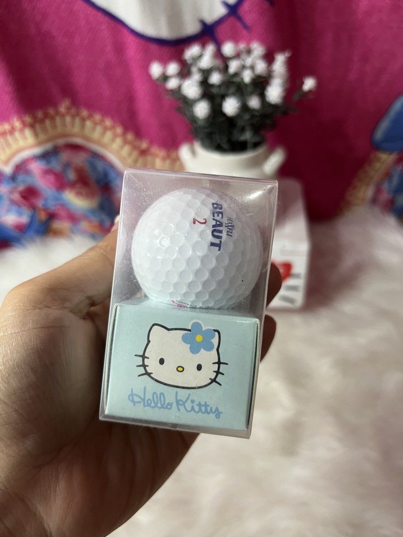 Hello Kitty Maxfli Beaut Golf Ball (Category: Golf) located in Manila. Submitted by janetecson05 (Listing ID 1468929514, Image 1). Description: - Official Maxfli Beaut Kitty golf ball - Features blue branding and a red number 2 - Comes with a cute light blue base sleeve and Kitty face graphic - Includes a clear display box for easy showcasing - Perfect collectible for golf enthusiasts and Sanrio fans - Stored safely in packaging.