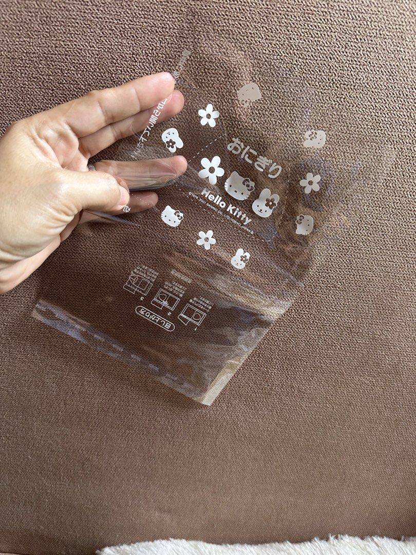 Hello Kitty Onigiri 100 Sheets (Category: Character Goods) located in Davao. Submitted by favoritepreloved (Listing ID 1468778555, Image 3). Description: 💜 (Hello Kitty Onigiri Deco Pack) box—a Japanese bento accessory used to wrap rice balls (onigiri). .