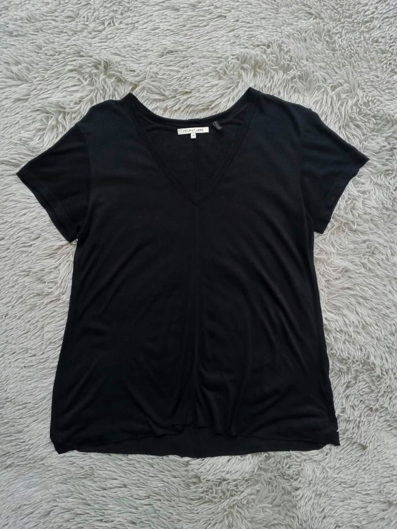 Helmut Lang Black Kinetic V-Neck Micro Modal Tee (Category: Shirts) located in Pasig City. Submitted by oo7-thriftnflip-oo7 (Listing ID 1468809509, Image 2). Description: Helmut Lang Black Kinetic V-Neck Micro Modal Tee Condition: Excellent Color Rate: 9.5/10 Size on tag: XS Dimes: W-17.5" x L-25" No Issue Price: 3,590 FREE shipping via J&T .