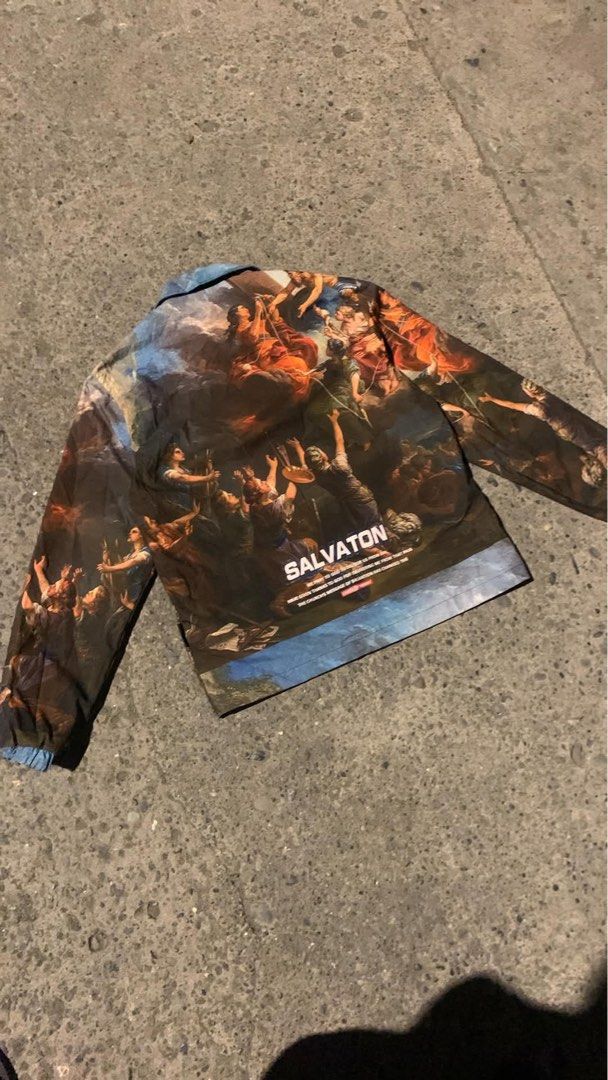 HENF SALVATON Renaissance Art Print Coach Jacket (Category: Coats, Jackets and Outerwear) located in Davao. Submitted by singkorayk15407 (Listing ID 1468899338, Image 3). Description: - Brand/Model: HENF SALVATON Coach Jacket - Design: All-over Renaissance art print with classic paintings graphic across body and sleeves - Features: Classic fold-over collar and snap button front closure - Style: Bold streetwear aesthetic in a dark colorway accente