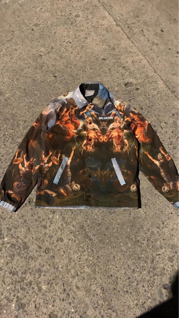 HENF SALVATON Renaissance Art Print Coach Jacket (Category: Coats, Jackets and Outerwear) located in Davao. Submitted by singkorayk15407 (Listing ID 1468899338, Image 1). Description: - Brand/Model: HENF SALVATON Coach Jacket - Design: All-over Renaissance art print with classic paintings graphic across body and sleeves - Features: Classic fold-over collar and snap button front closure - Style: Bold streetwear aesthetic in a dark colorway accente