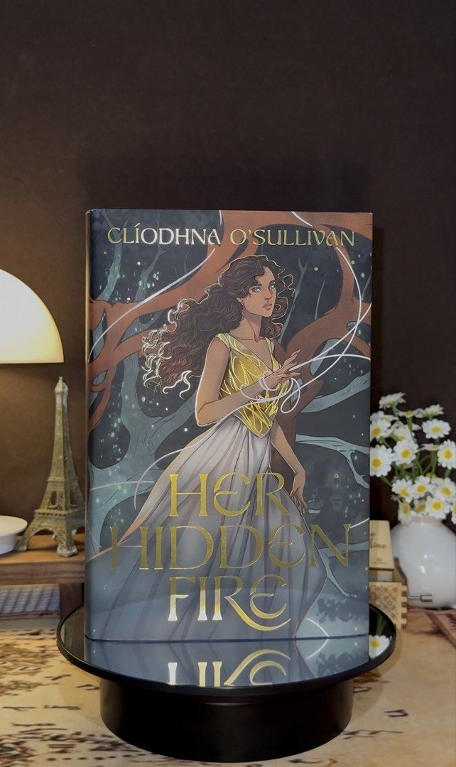 Her Hidden Fire | FairyLoot Edition (Category: Storybooks) located in Siaton. Submitted by bookish_zyn (Listing ID 1468775692, Image 1). Description: FairyLoot Exclusive Edition of Her Hidden Fire by Cliodhna O'Sullivan. Features custom cover art, sprayed edges, and foil stamping. Unread and shelf-stored in pristine condition..