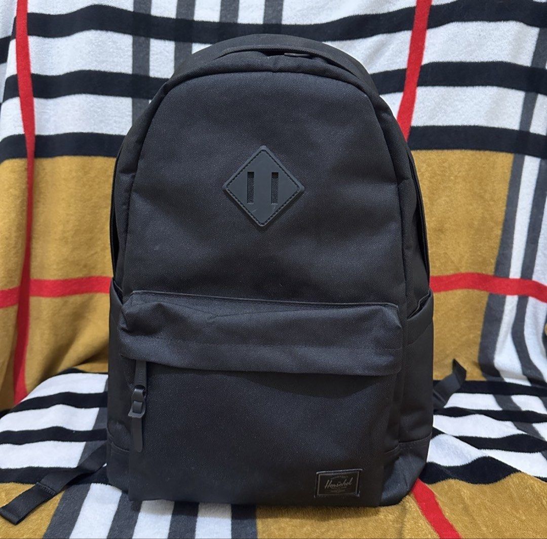 Herschel Heritage 24L Black Tonal (Category: Backpacks) located in Dasmarinas. Submitted by jco.ollirum (Listing ID 1468725512, Image 1). Description: Herschel Heritage 24L Black Tonal - Signature diamond detail padded floating sleeve fits a 15in/16in laptop - 18" (H) x 12.2" (W) x 6.5" (D) - Almost New/Like New/ Used 4-5 Times - Customized with inner zipper pocket (see pictures/detachable) - Comes with tags - Bought for: SRP 5,790 - Selling for: