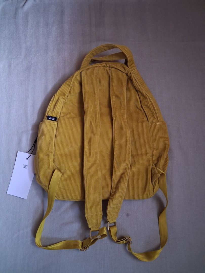 Herschel Nova mid-volume backpack (Category: Backpacks) located in Quezon City. Submitted by threeleggeddog (Listing ID 1468824857, Image 2). Description: brand new mustard yellow color corduroy material.