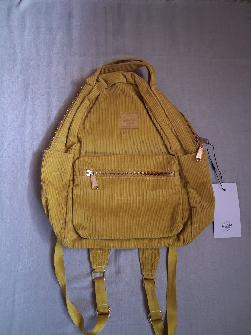 Herschel Nova mid-volume backpack (Category: Backpacks) located in Quezon City. Submitted by threeleggeddog (Listing ID 1468824857, Image 1). Description: brand new mustard yellow color corduroy material.