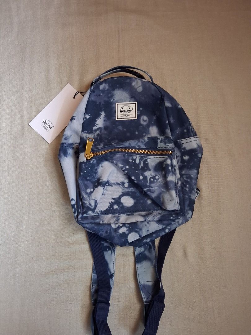 Herschel Nova mini backpack (Category: Backpacks) located in Quezon City. Submitted by threeleggeddog (Listing ID 1468823433, Image 1). Description: brand new blue (camo) color.