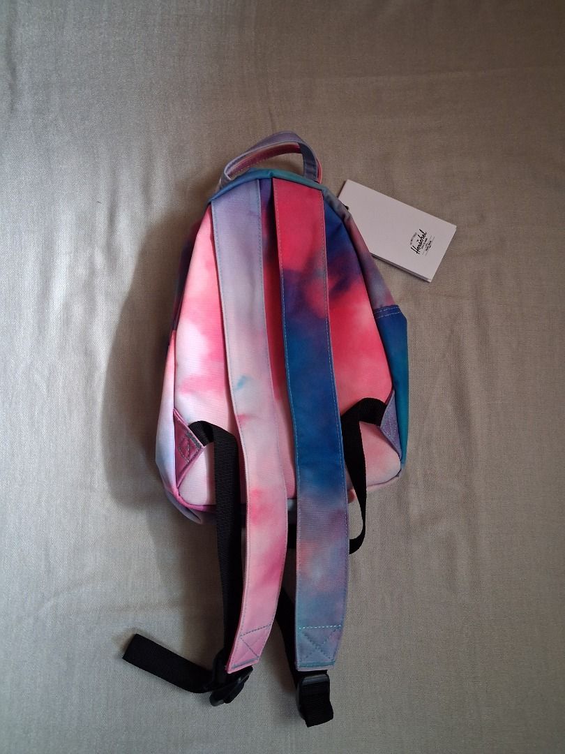 Herschel Nova mini backpack (Category: Backpacks) located in Quezon City. Submitted by threeleggeddog (Listing ID 1468826559, Image 2). Description: brand new cloudburst neon color.